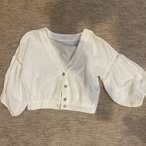 White statement sleeve crop top